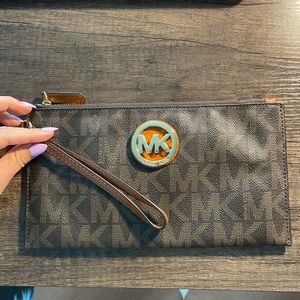 Michael Kordich Jet set wristlet